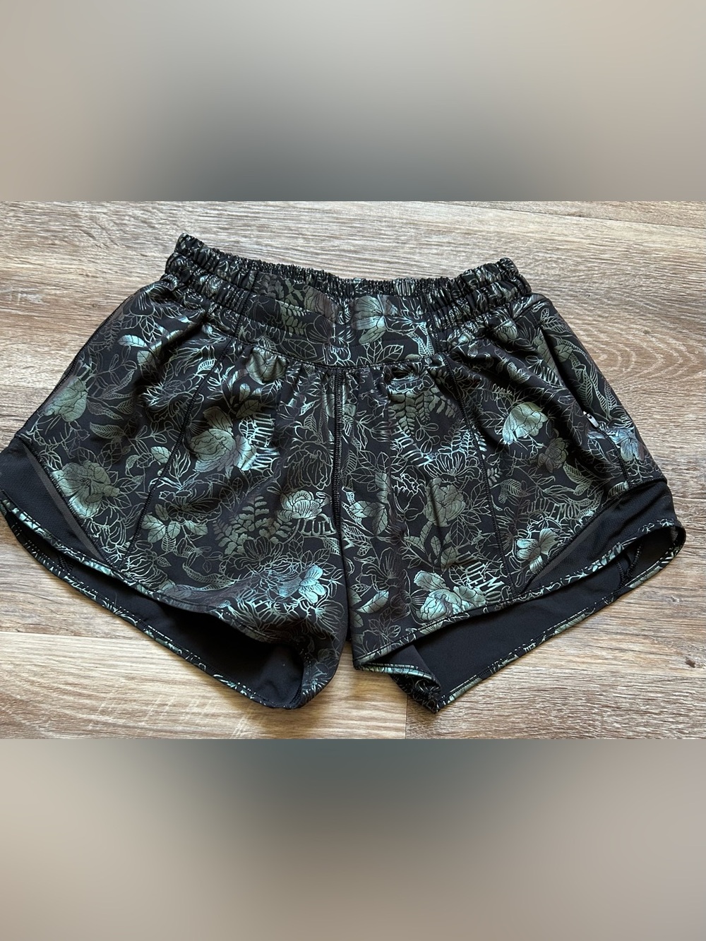lululemon athletica Black Shorts with Metallic Green Floral Print